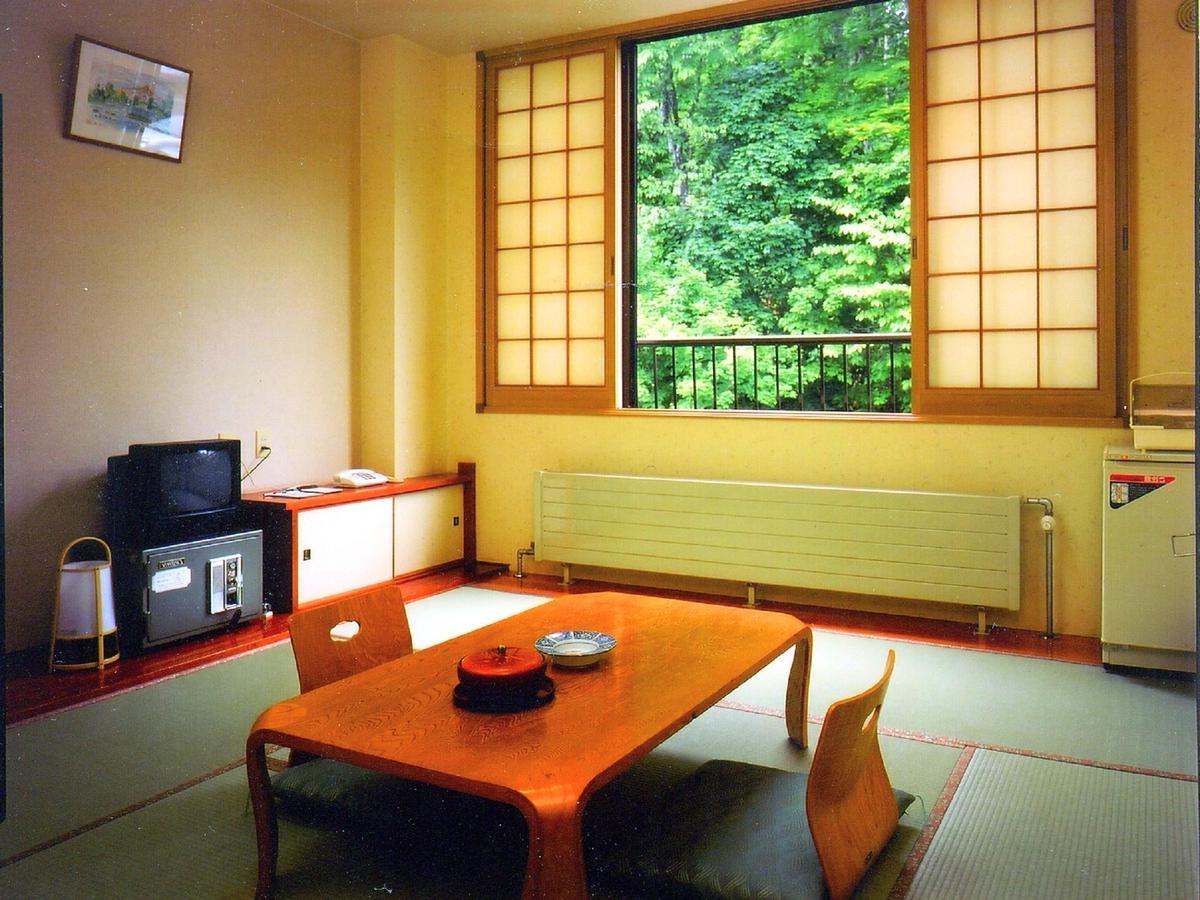 Marukoma Onsen Ryokan Chitose  Extérieur photo